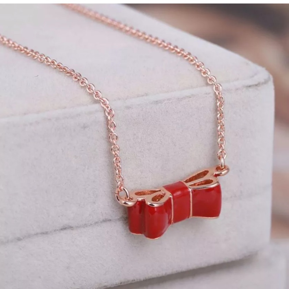 NWT Kate♠️Rose Gold Enamel Red Take A Bow Necklace - Picture 2 of 4
